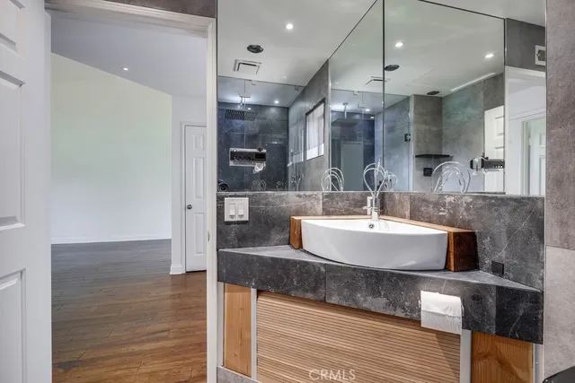 a view of living room with granite countertop furniture and fireplace