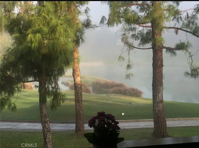 a view of a lake from a balcony