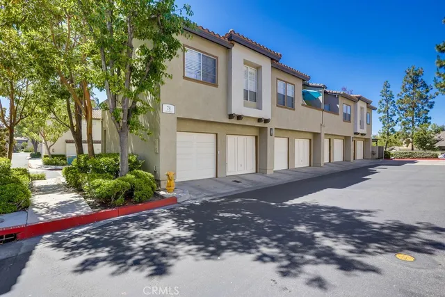 a view of a house with a street