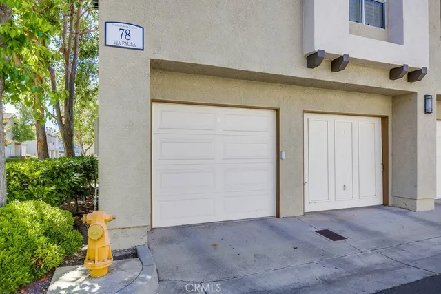 a front view of a house with a garage