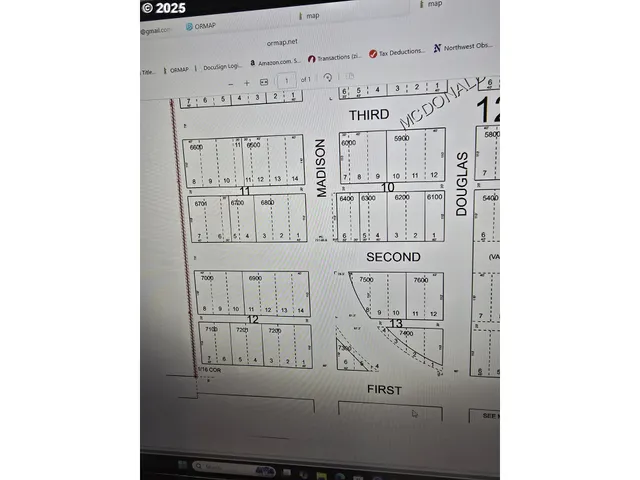 a view of field with trees