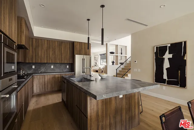 a view of a swimming pool with a lounge chairs
