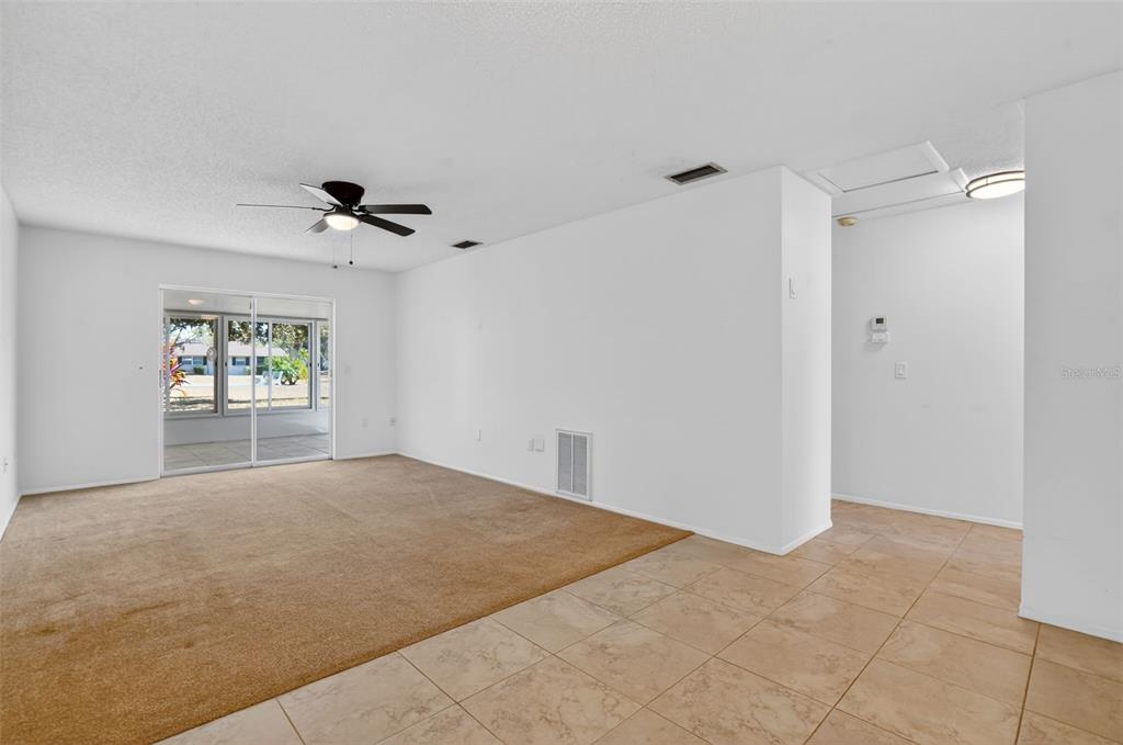2560 Golf Course Drive, Unit 507 Sarasota, FL 34234 - Photo 17 of 43 a view of an empty room with a window
