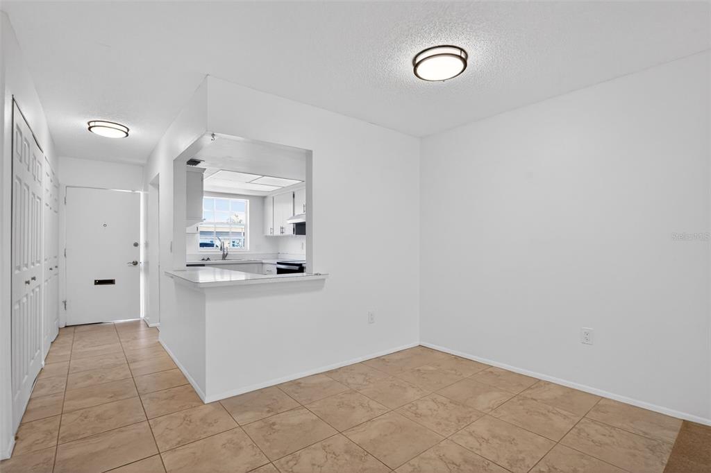 2560 Golf Course Drive, Unit 507 Sarasota, FL 34234 - Photo 22 of 43 a view of a kitchen with a sink
