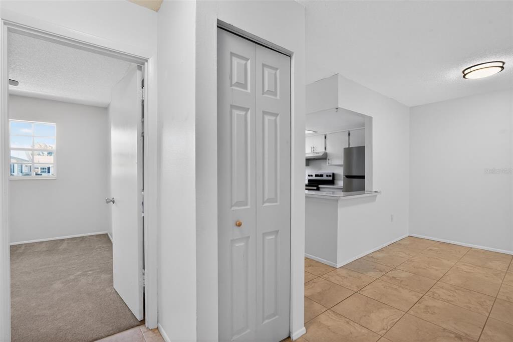 2560 Golf Course Drive, Unit 507 Sarasota, FL 34234 - Photo 23 of 43 a view of kitchen and utility room