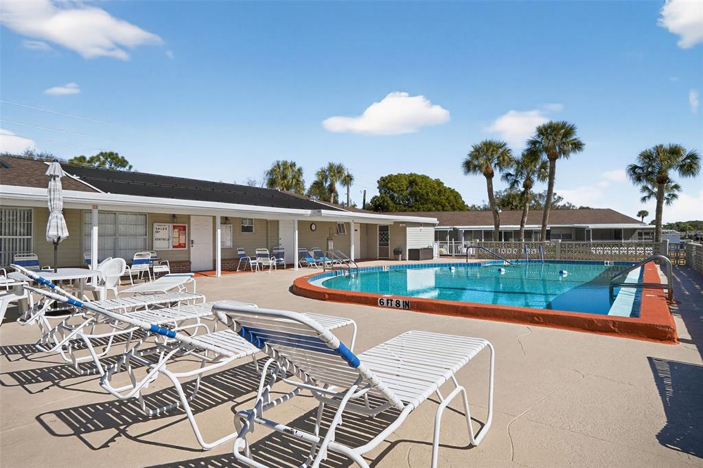 2560 Golf Course Drive, Unit 507 Sarasota, FL 34234 - Photo 35 of 43 a view of an outdoor space with seating area