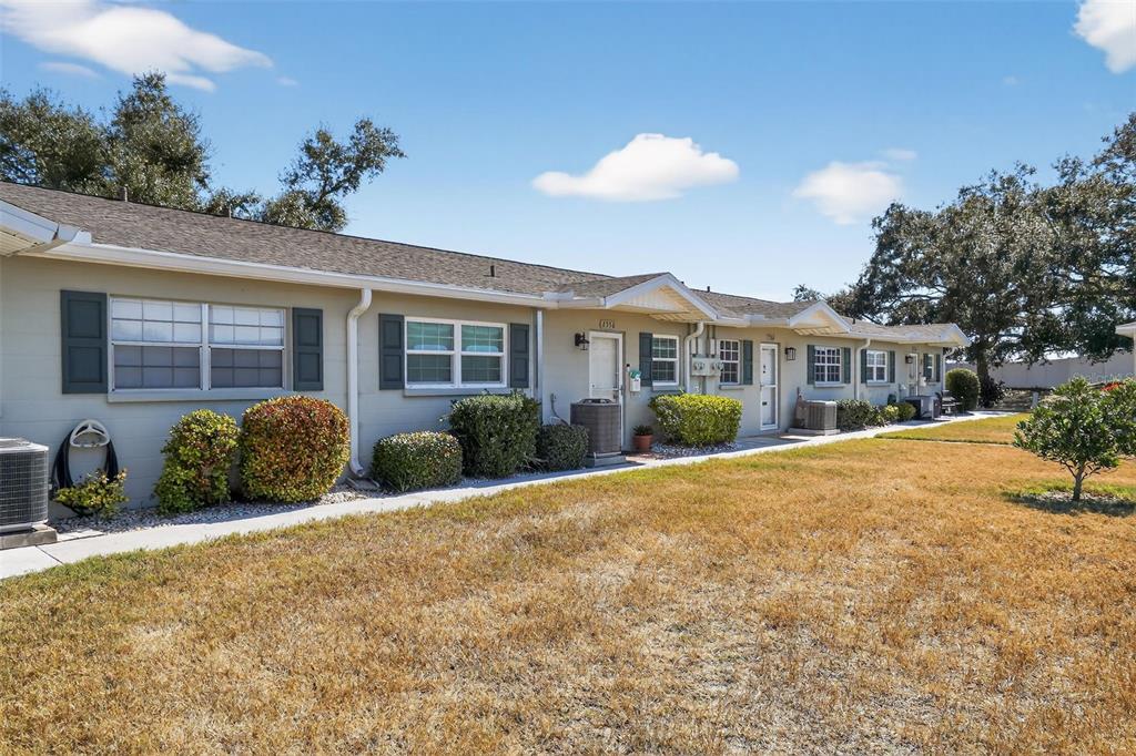 2560 Golf Course Drive, Unit 507 Sarasota, FL 34234 - Photo 42 of 43 a view of a house with a patio