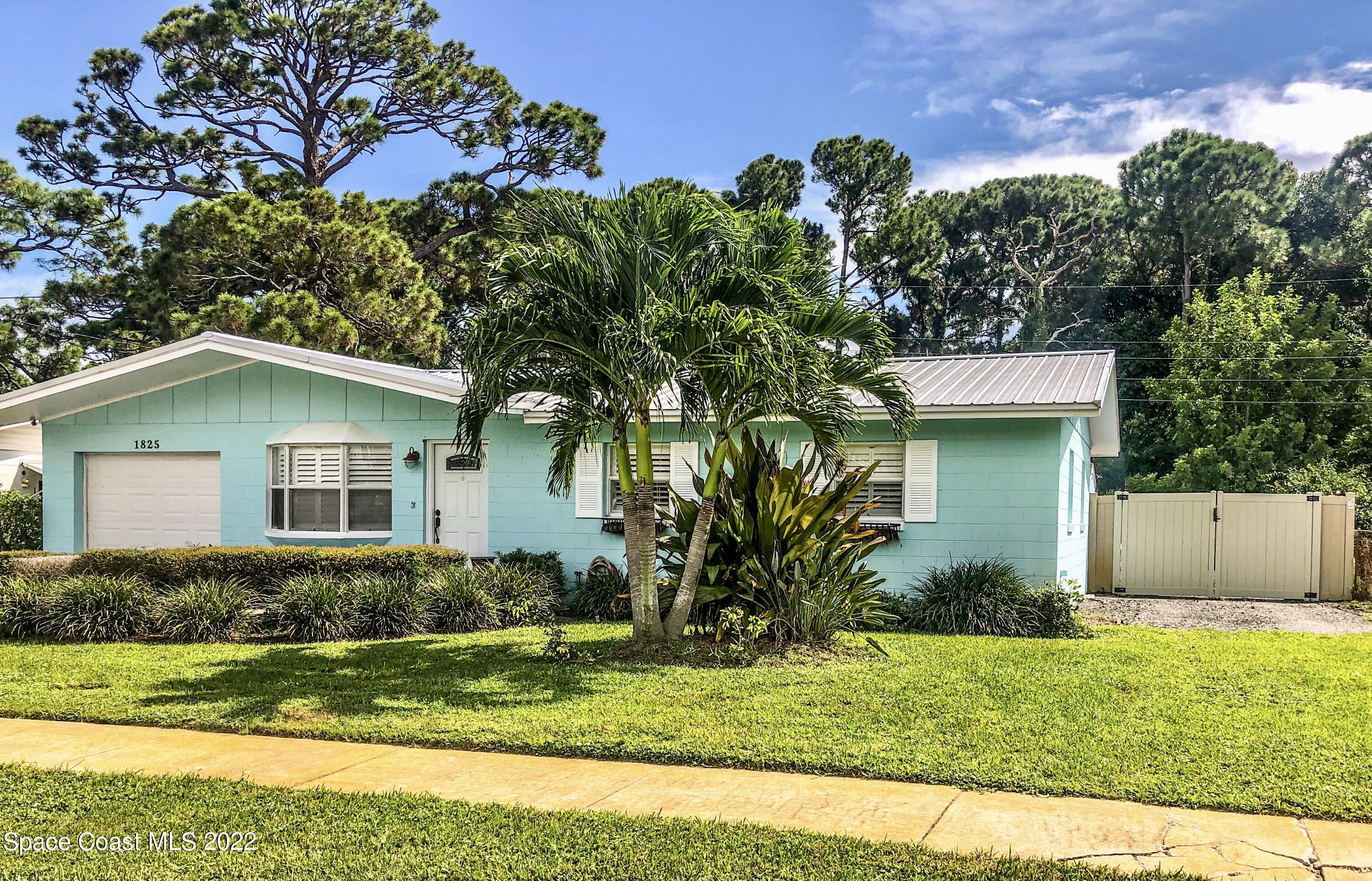 1825 Vía Roma Merritt Island, FL 32952 - Photo 2 of 19 20220917_190316309_iOS