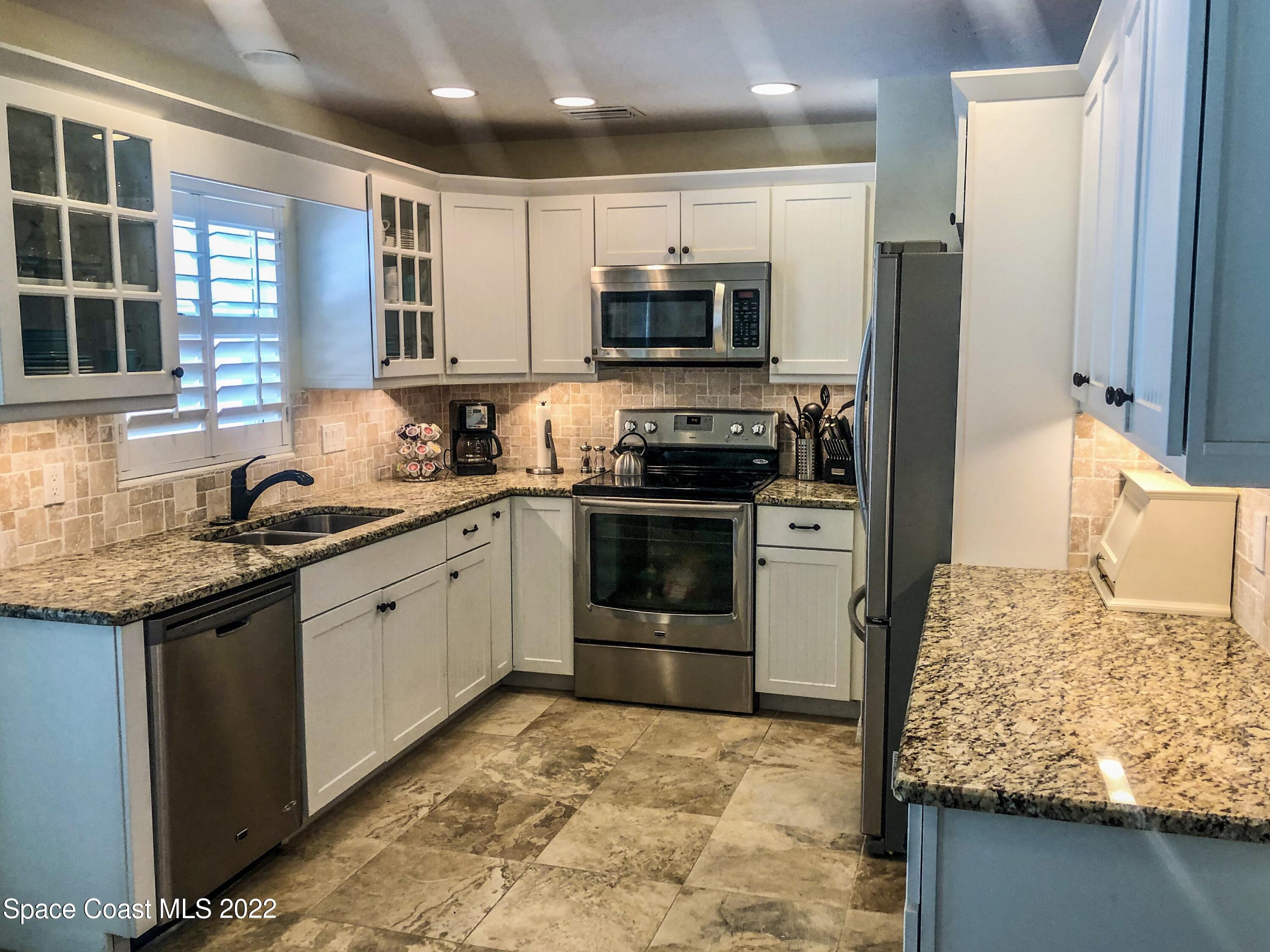 1825 Vía Roma Merritt Island, FL 32952 - Photo 3 of 19 20220917_184113130_iOS