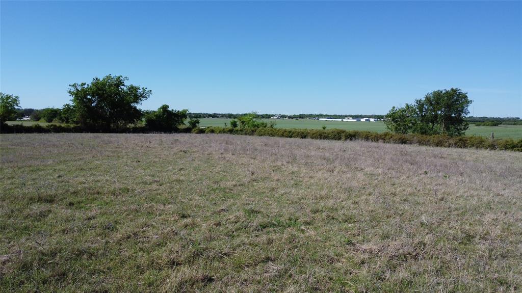 261 County Road 403 Comanche, TX 76442 - Photo 1 of 7 a view of an outdoor space and a yard