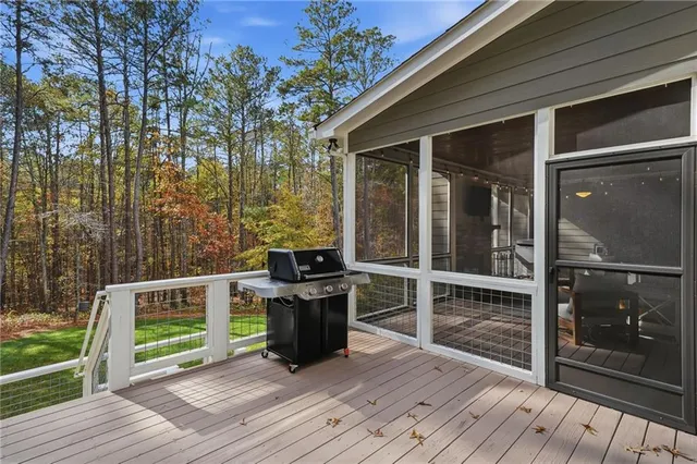 a front view of a house with a yard table and chairs