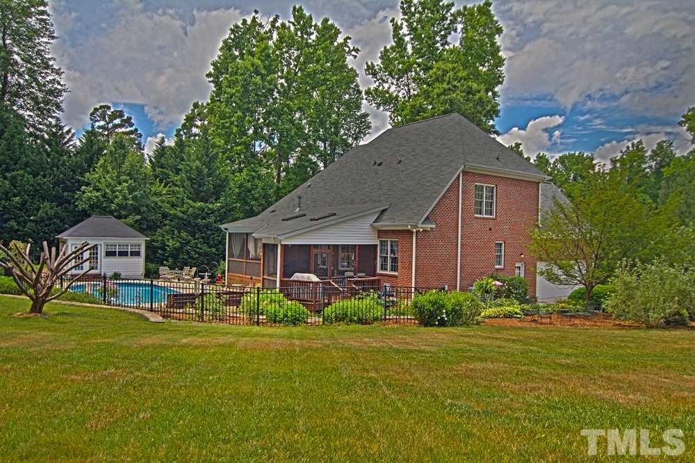 Gorgeous yard, landscaping and in ground pool