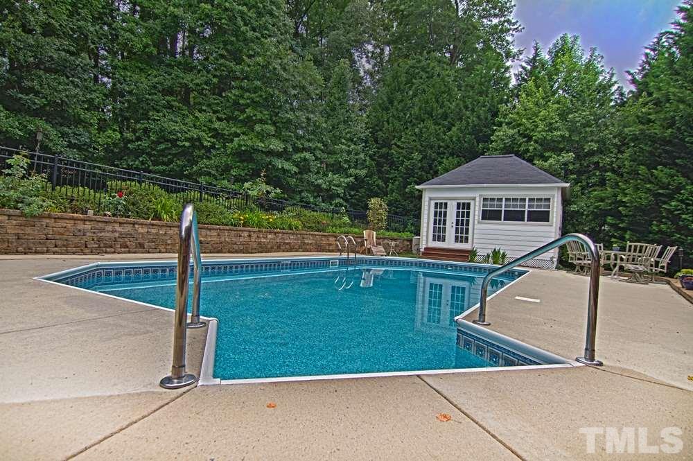 Beautiful pool with pool house for easy storage