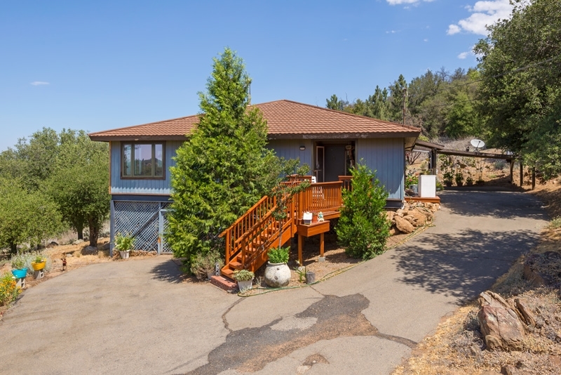 Single level home with 8 acres of privacy.