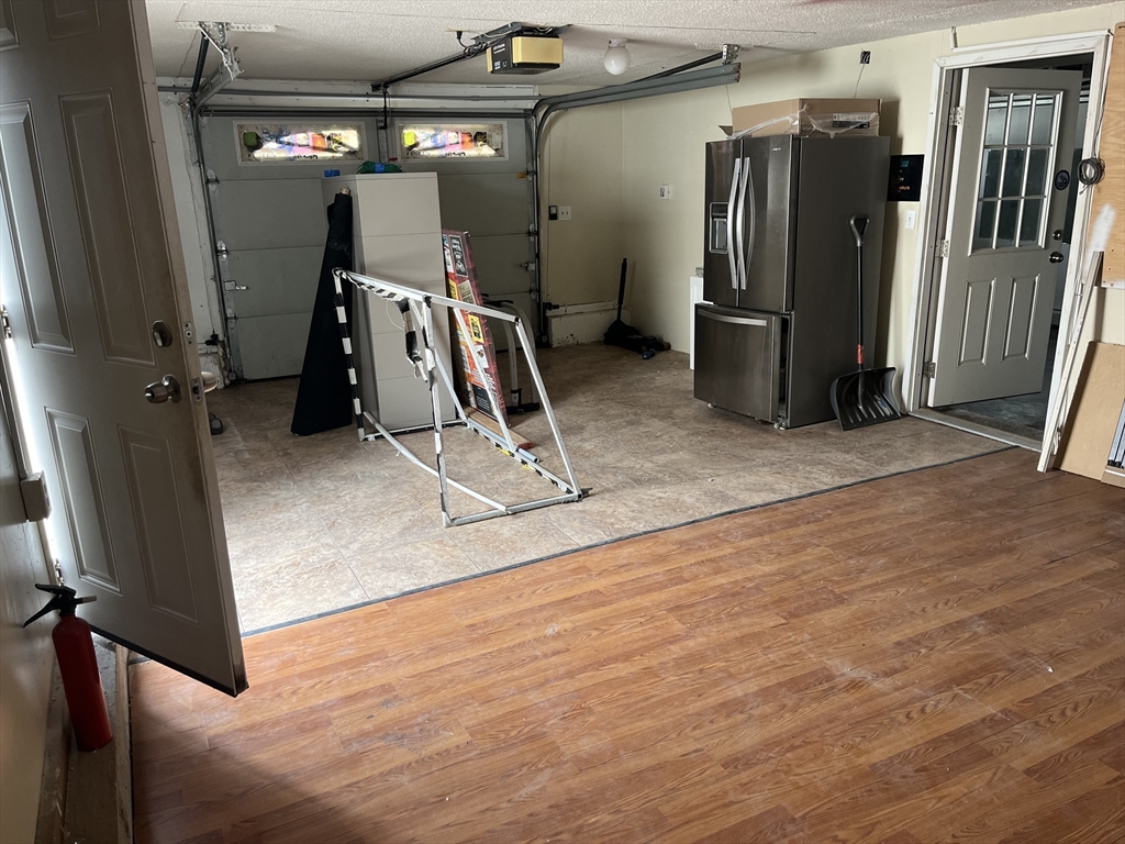 58 Brunswick Street Lowell, MA 01852 - Photo 21 of 33 a view of a room with gym equipment