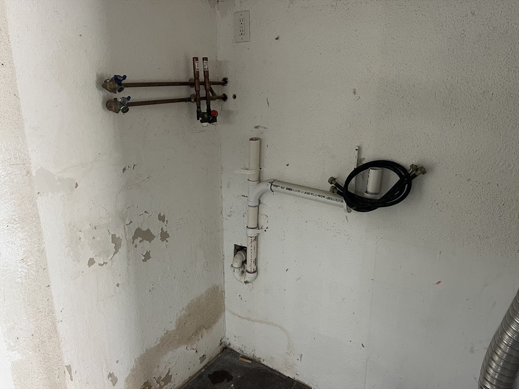 58 Brunswick Street Lowell, MA 01852 - Photo 24 of 33 a bathroom with a shower