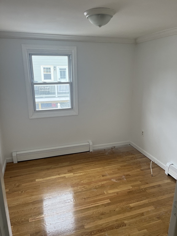 58 Brunswick Street Lowell, MA 01852 - Photo 10 of 33 a view of empty room with window