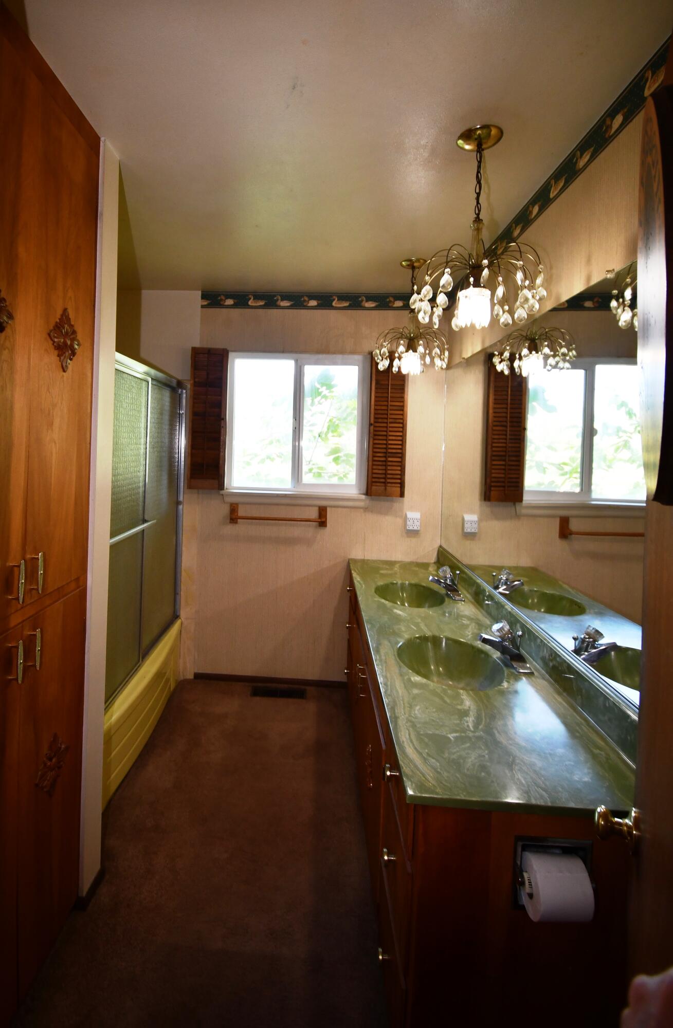 41916 Creighton Road Fall River Mills, CA 96028 - Photo 30 of 50 a bathroom with a granite countertop sink a mirror a window and a shower