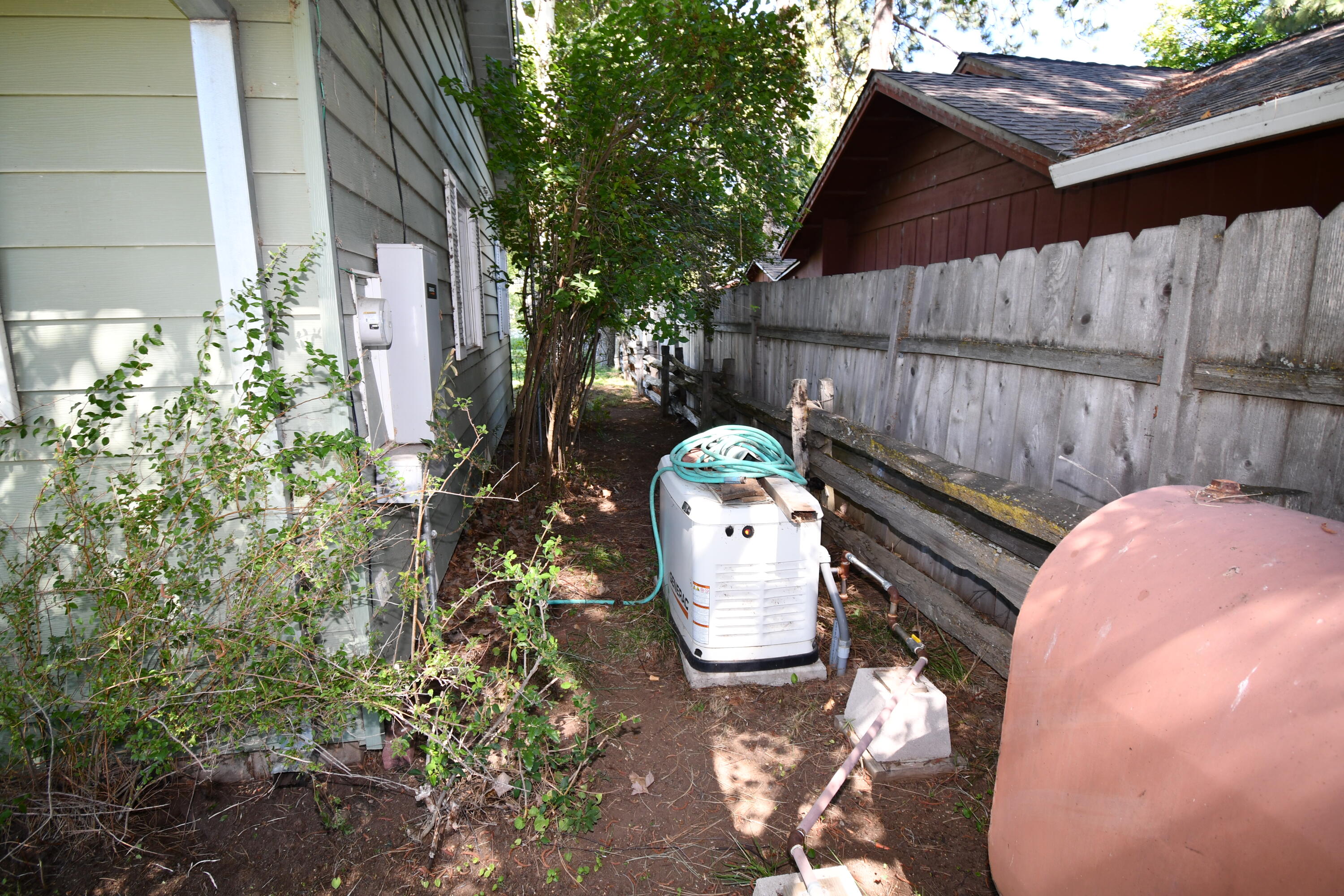 41916 Creighton Road Fall River Mills, CA 96028 - Photo 50 of 50 a view of a backyard with table and chairs and wooden fence