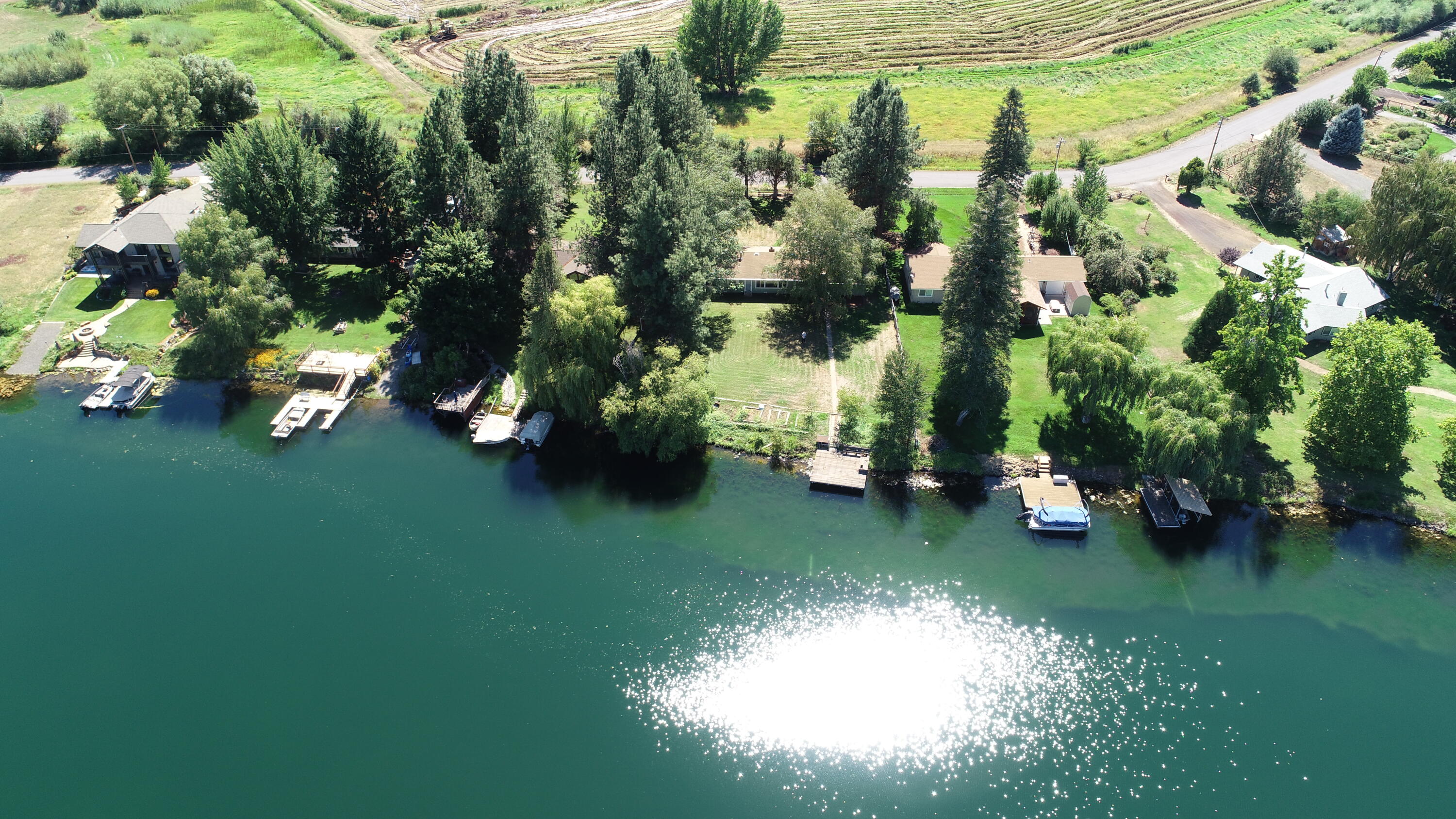 41916 Creighton Road Fall River Mills, CA 96028 - Photo 5 of 50 a view of a lake from a yard