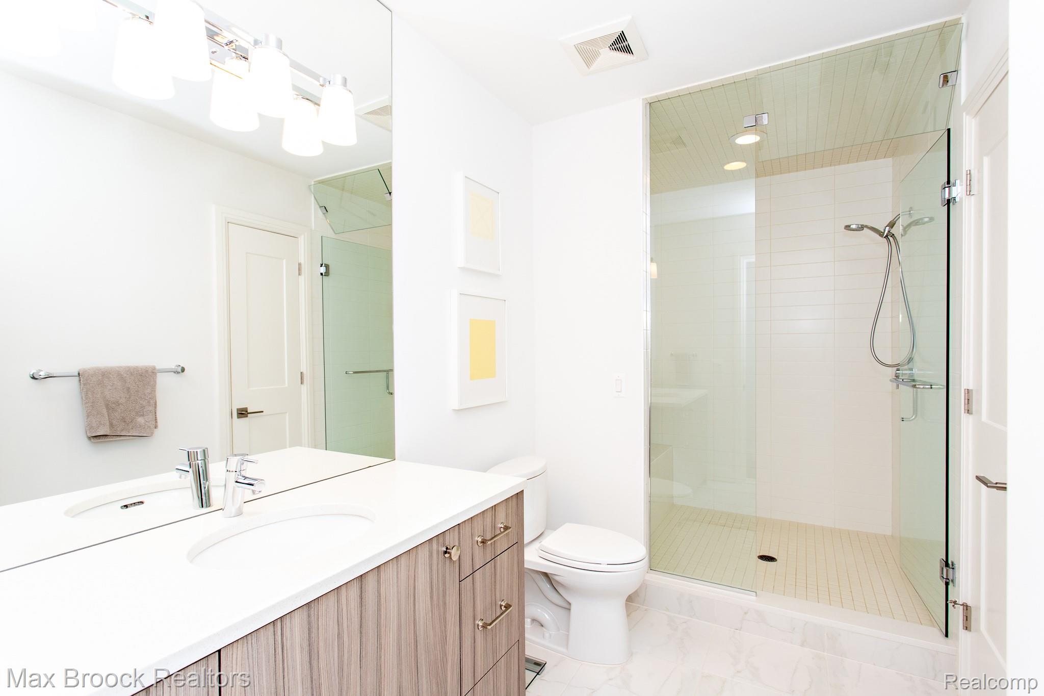 25925 York Road Royal Oak, MI 48067 - Photo 72 of 88 Bathroom featuring a stall shower, vanity, and recessed lighting