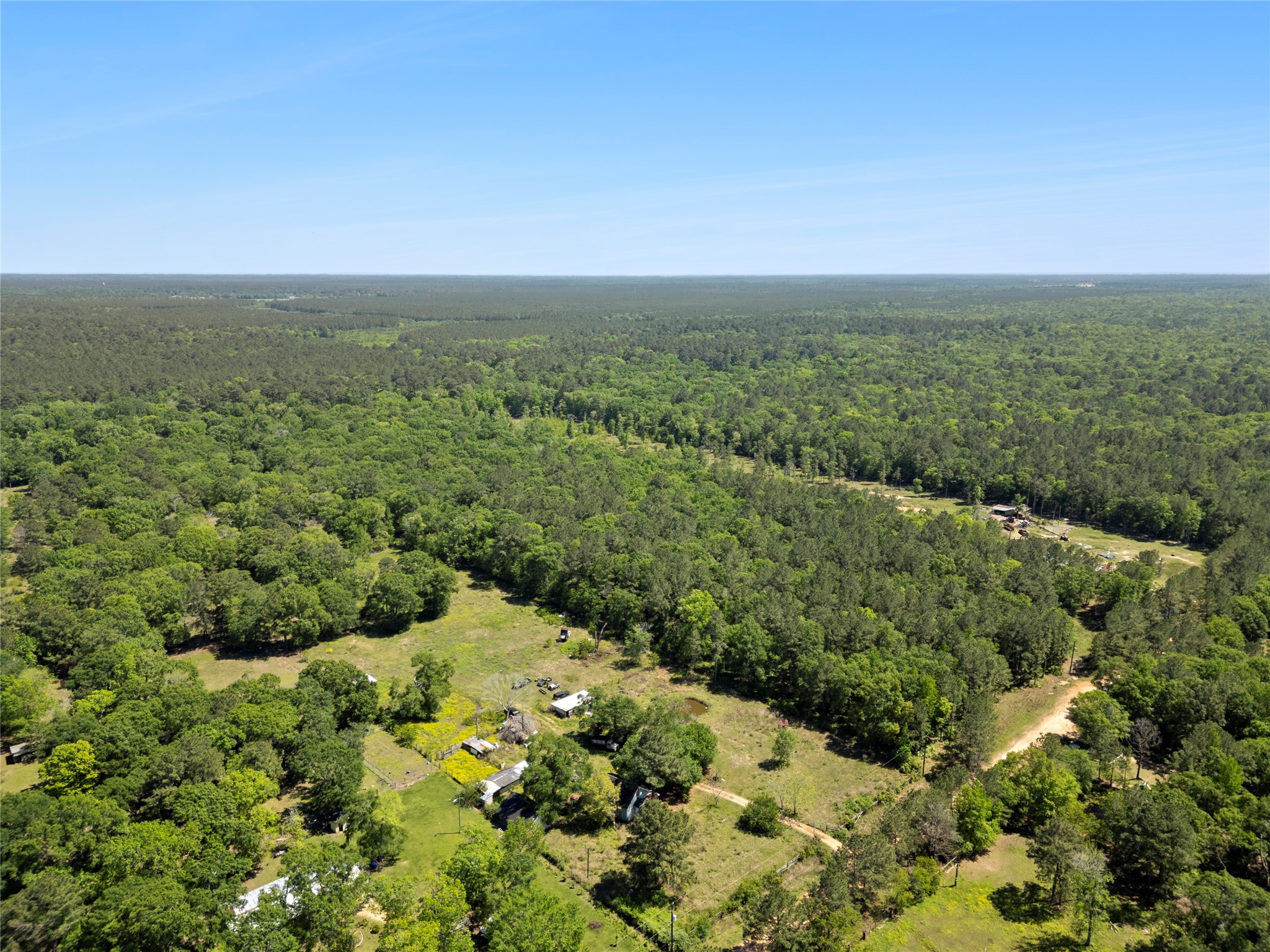 0 Maxine Lane Cleveland, TX 77328 - Photo 2 of 5 a view of a green field