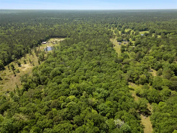a view of a field with an outdoor space