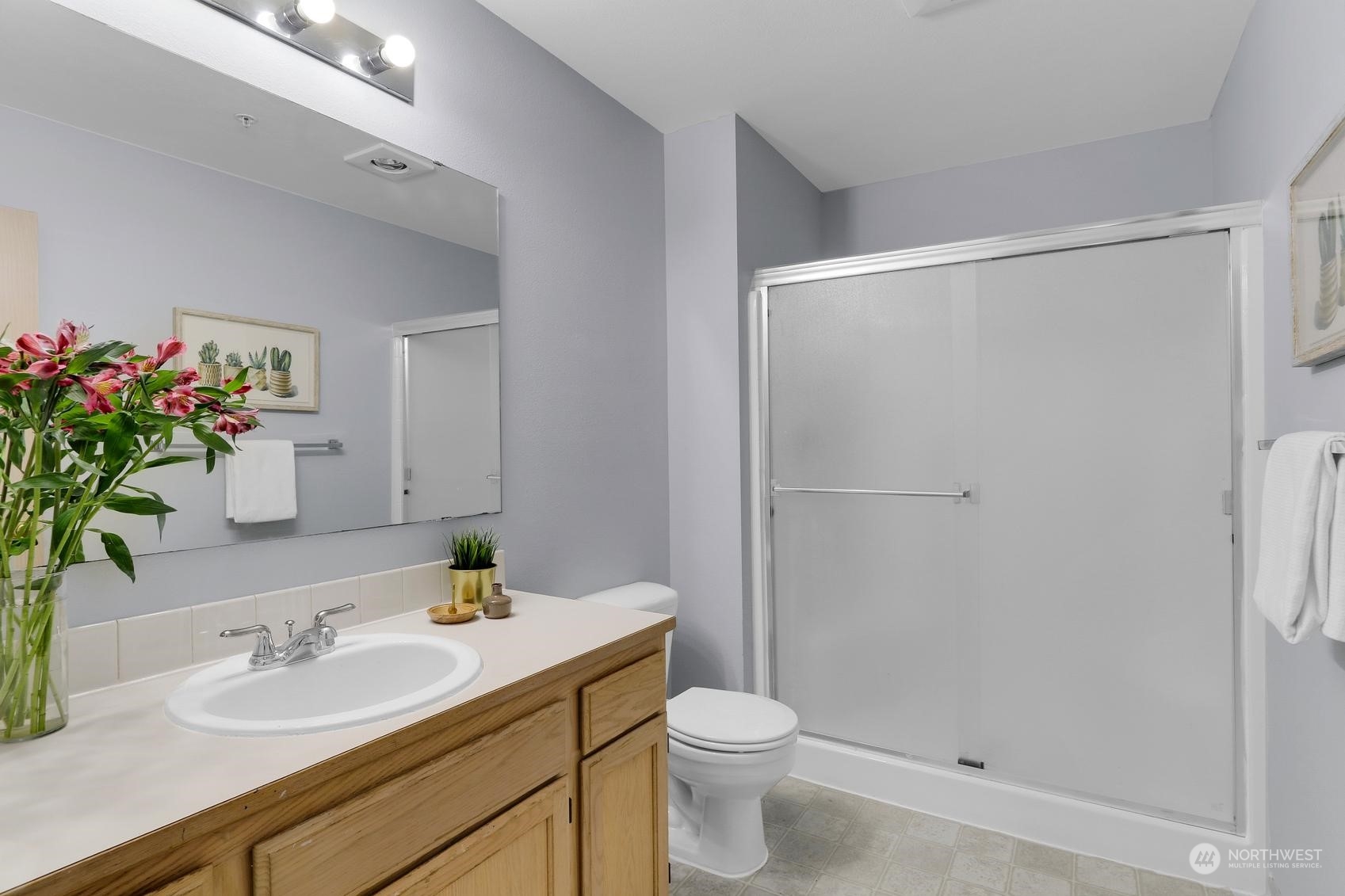 1001 West Casino Road, Unit C103 Everett, WA 98204 - Photo 13 of 23 a bathroom with a sink toilet and shower