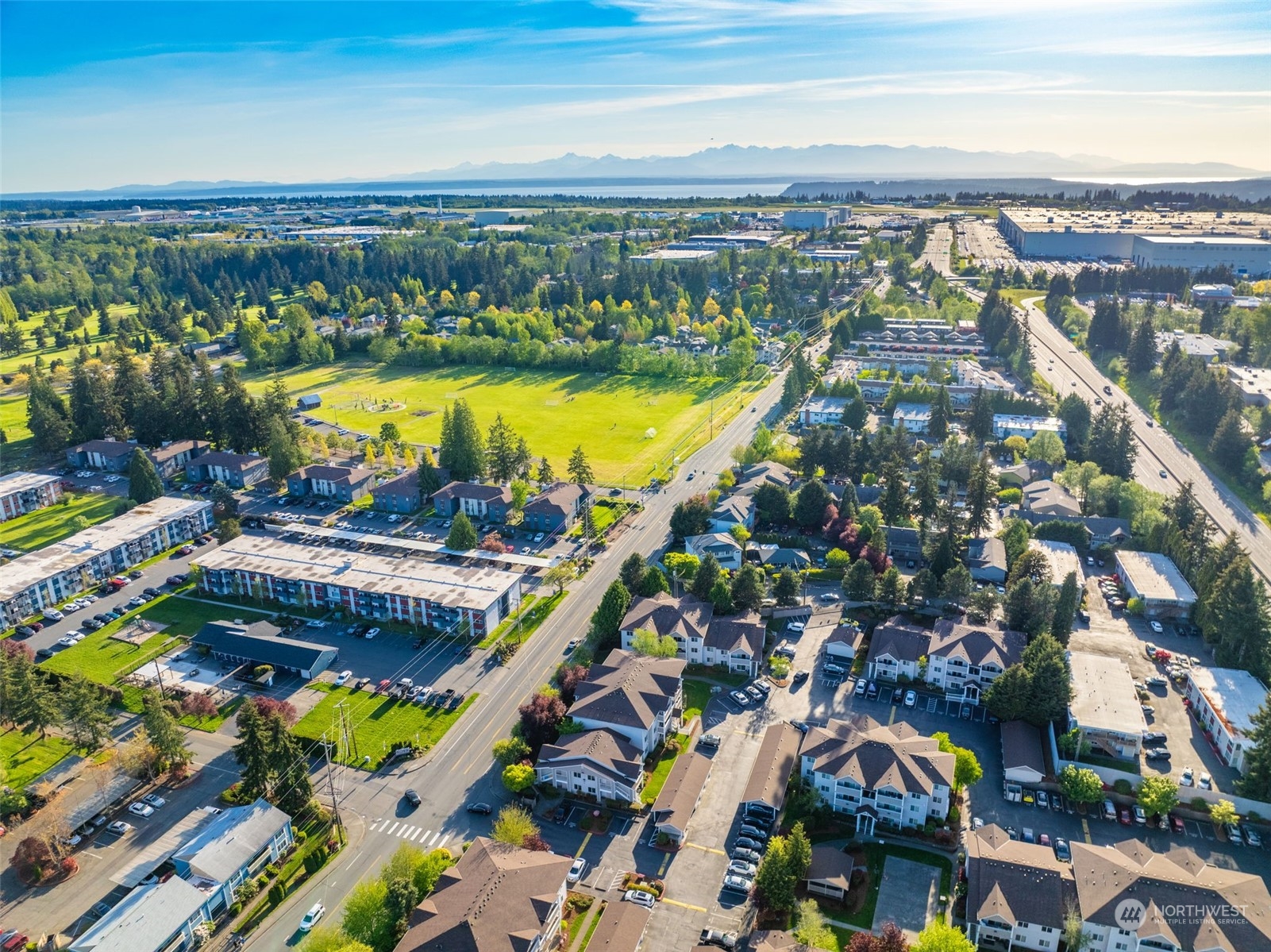 1001 West Casino Road, Unit C103 Everett, WA 98204 - Photo 23 of 23 a view of a city with an ocean