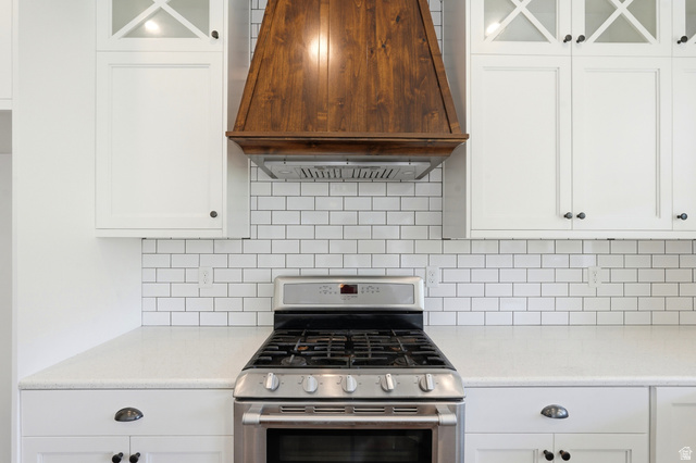 338 Windy Rdg Drive Smithfield, UT 84335 - Photo 14 of 63 Stainless steel gas range with a wood-finish range hood