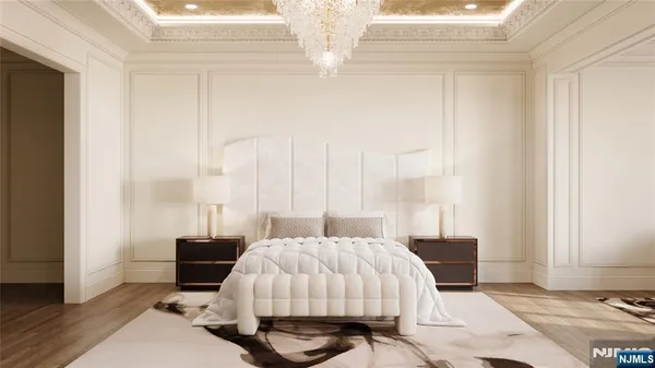 a living room with furniture wooden floor and a chandelier