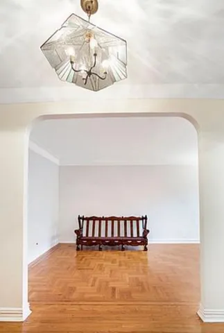 a view of a room with cabinet and a projector