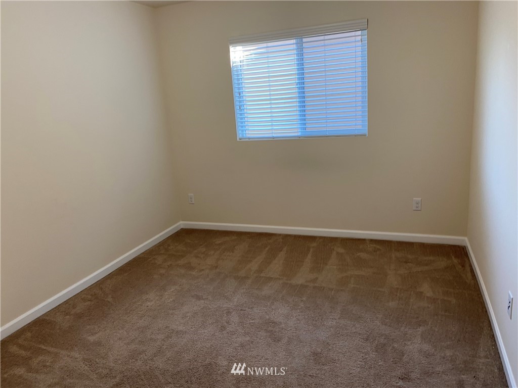3406 176th Place Southeast Bothell, WA 98012 - Photo 14 of 19 an empty room with a window