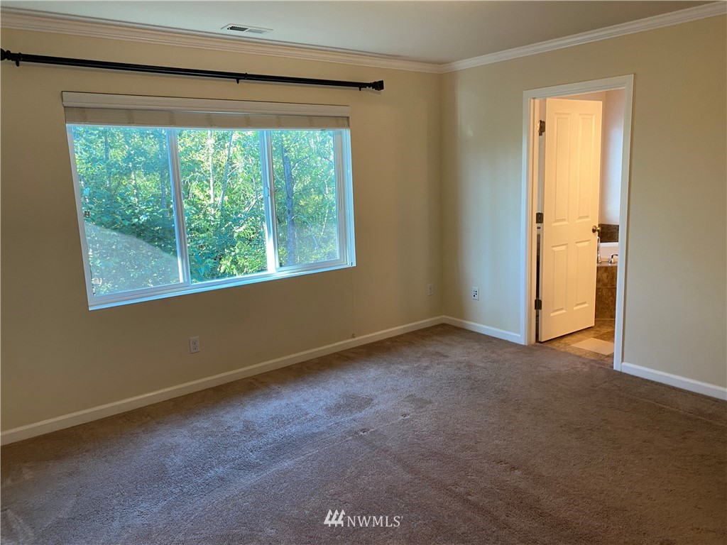 3406 176th Place Southeast Bothell, WA 98012 - Photo 9 of 19 an empty room with a window