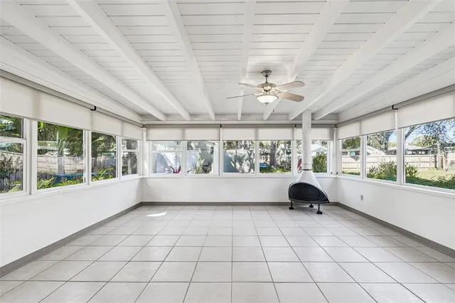 a kitchen with stainless steel appliances a refrigerator sink and cabinets