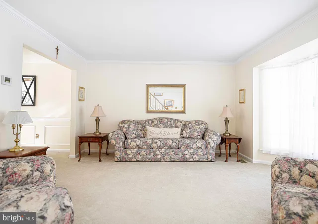 a living room with furniture and a couch