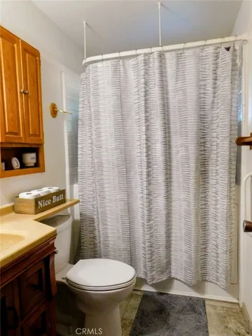 a bathroom with a sink and toilet