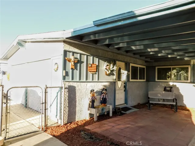 a view of livingroom with furniture and floor to ceiling window
