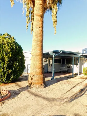 a view of a house with entertaining space