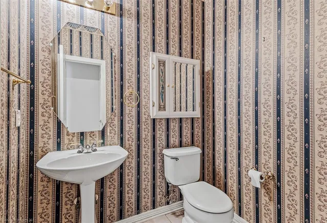 a view of an empty room with a fireplace