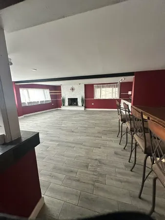 a view of a living room with furniture