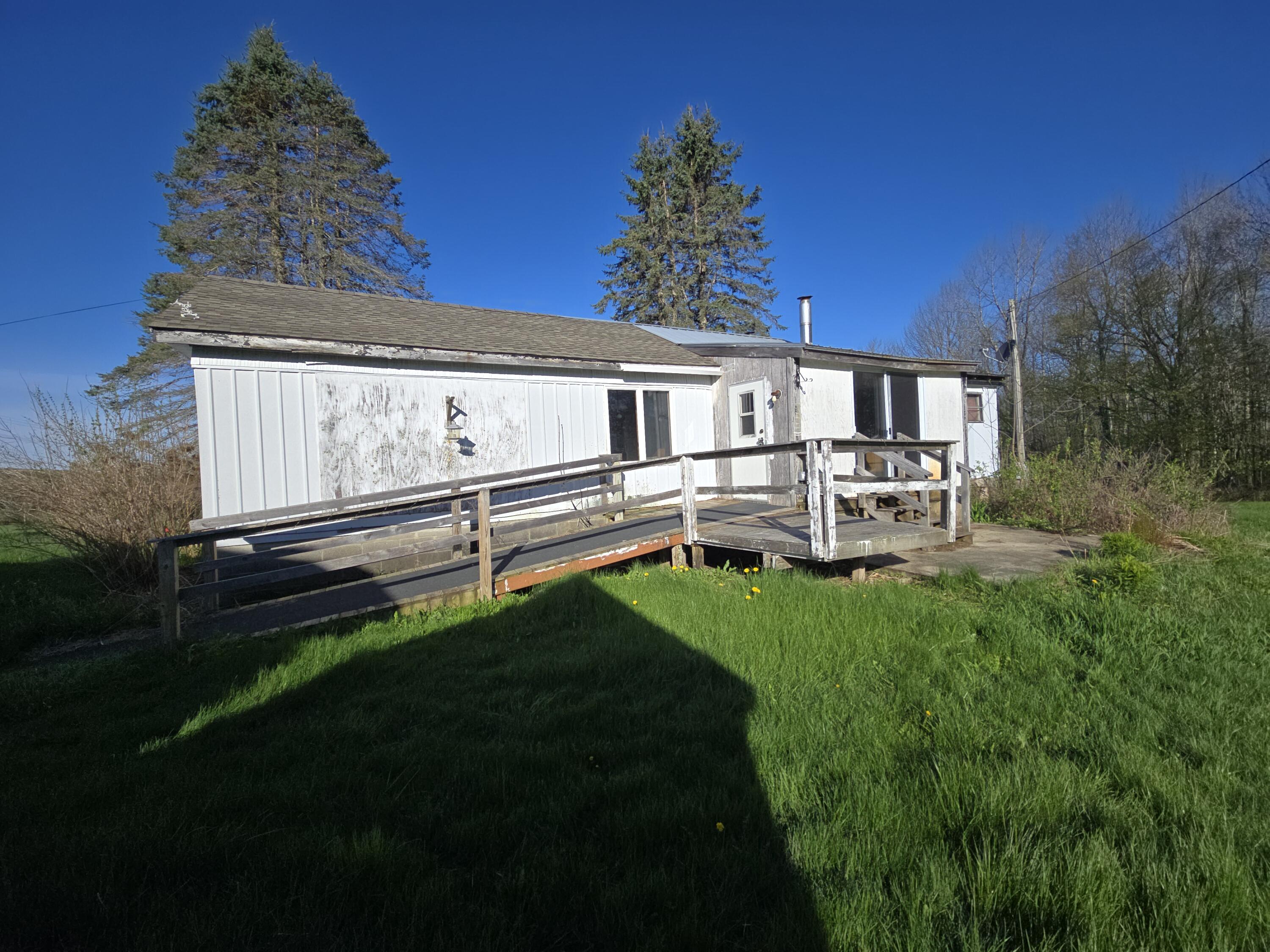 166 Belfast Road Knox, ME 04986 - Photo 8 of 19 Back Side of Home with Ramp