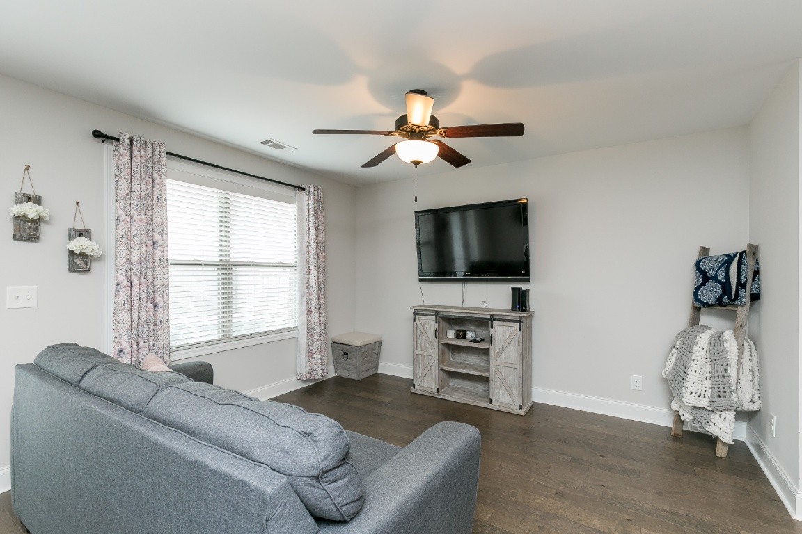 272 Signature Place Lebanon, TN 37087 - Photo 13 of 36 a living room with furniture and a flat screen tv