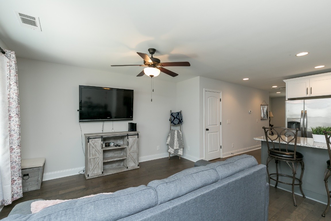 272 Signature Place Lebanon, TN 37087 - Photo 16 of 36 a living room with furniture and a flat screen tv