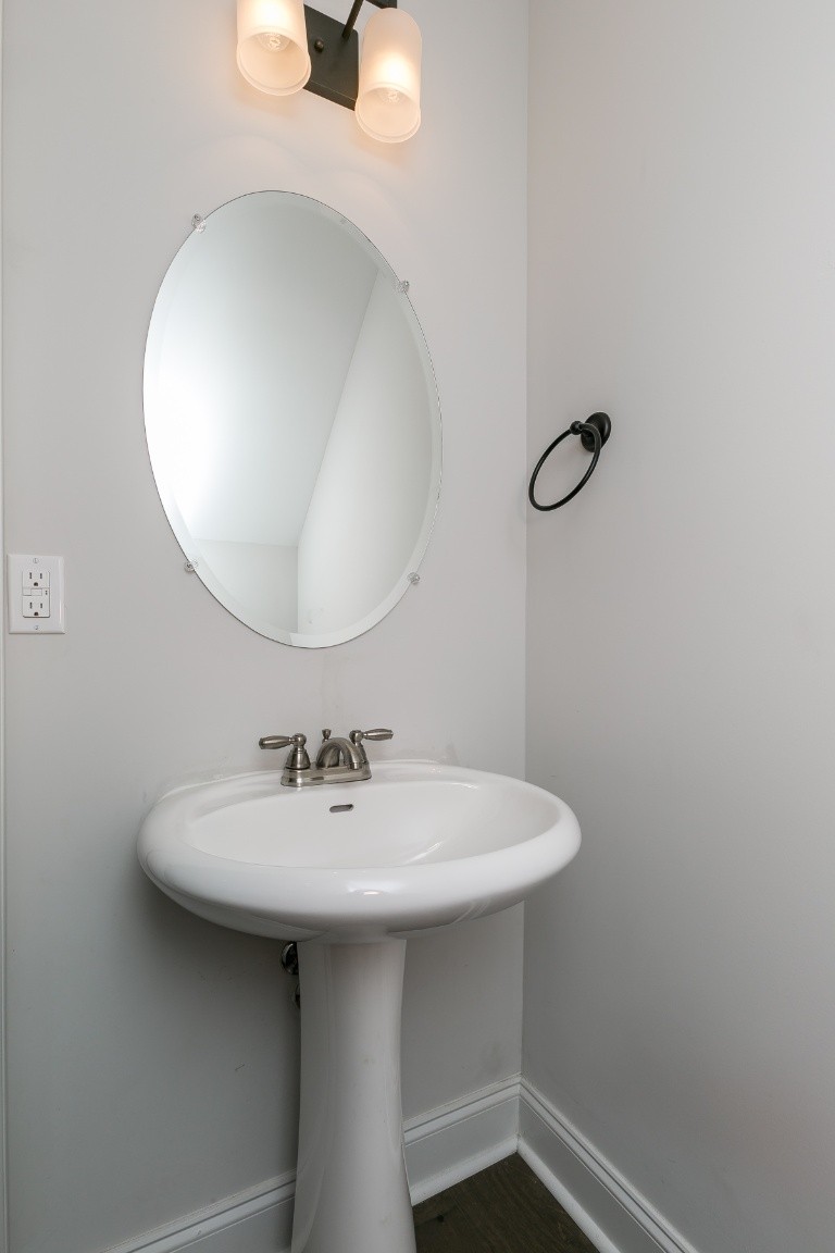 272 Signature Place Lebanon, TN 37087 - Photo 20 of 36 a bathroom with a sink a mirror and shower