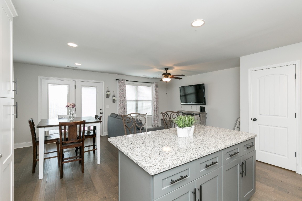 272 Signature Place Lebanon, TN 37087 - Photo 9 of 36 a view of a dining room with furniture and wooden floor