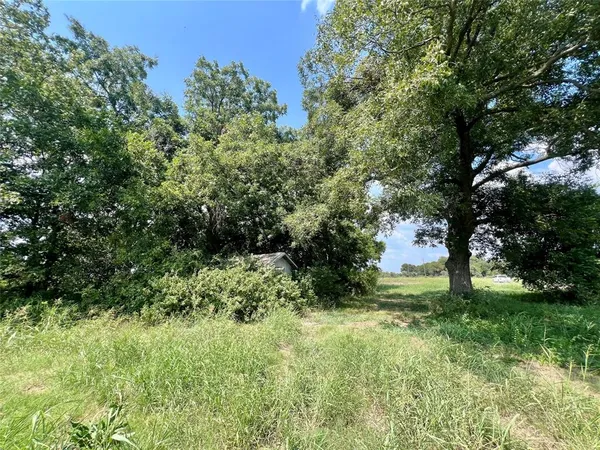 a view of outdoor space with a lake view