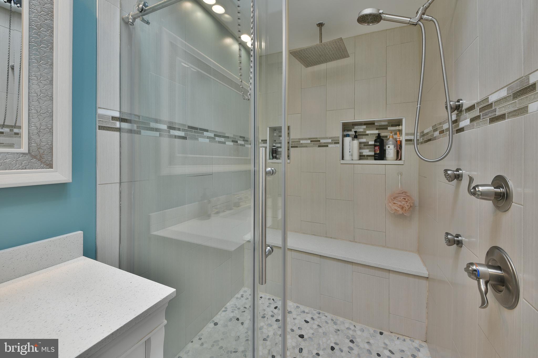 3137 Draper Street Philadelphia, PA 19136 - Photo 31 of 39 a bathroom with a shower and a sink