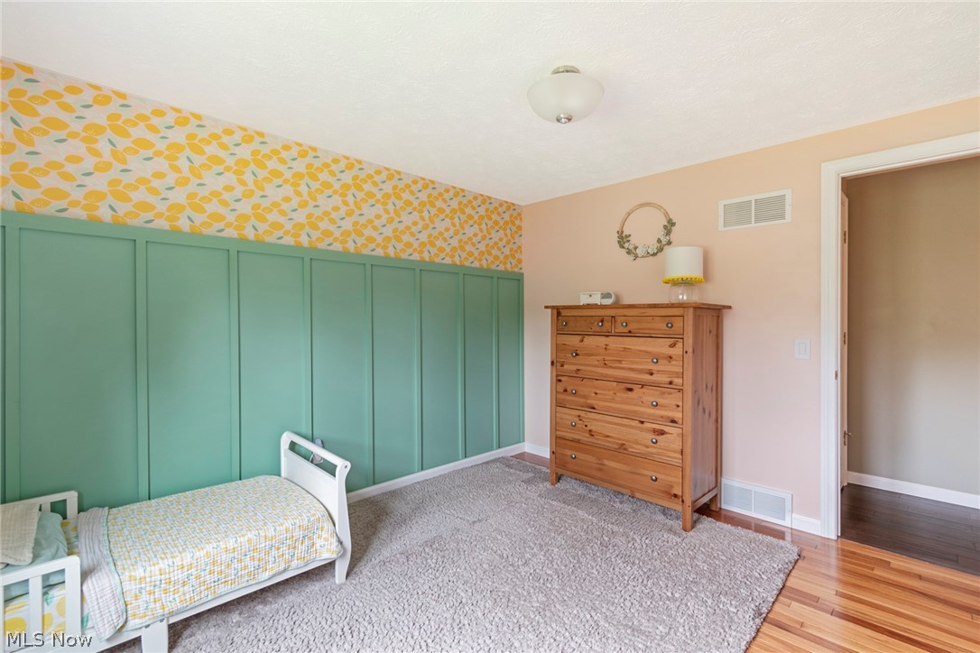 8370 Herbert Road Canfield, OH 44406 - Photo 20 of 48 Bedroom with light hardwood / wood-style flooring and a closet