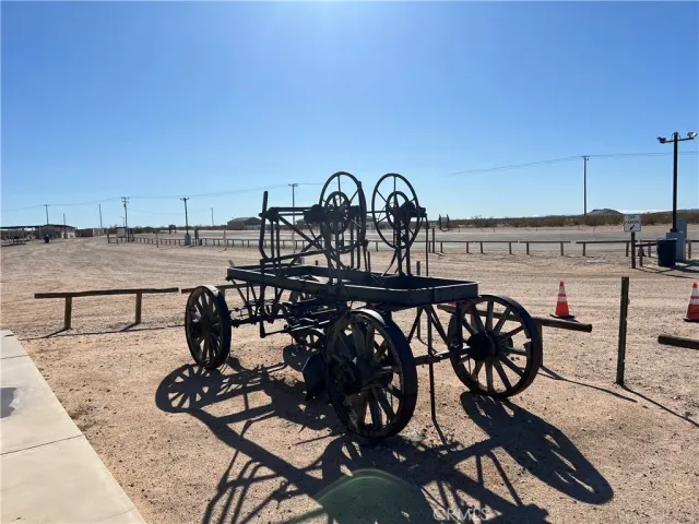 a view of a dinning tables and chairs in the terrace